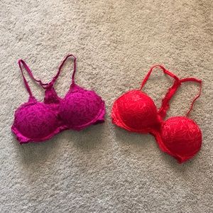 Two PINK lace date racer back bras.